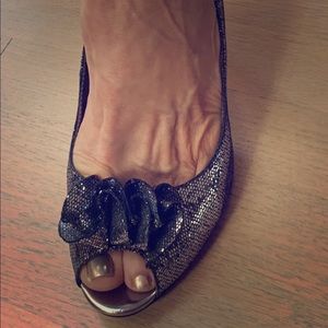 Size 9 M evening shoes. Barely worn.